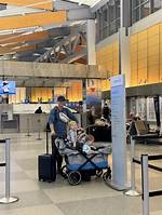 American Airlines Mother Struck by Stroller Tried Fitting Large Buggy
